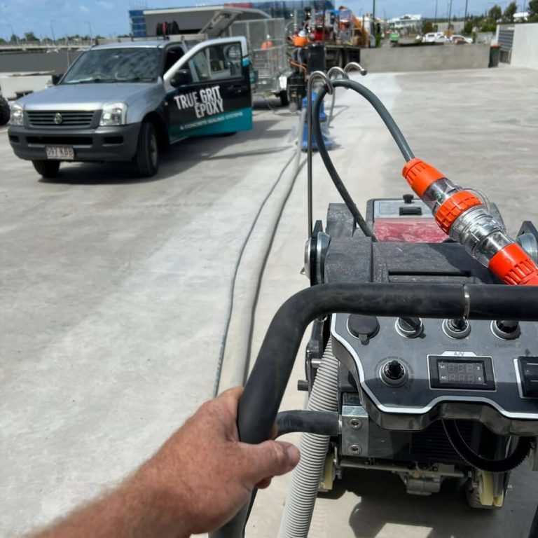 Point of view of a person using a machine to polish a parking lot.